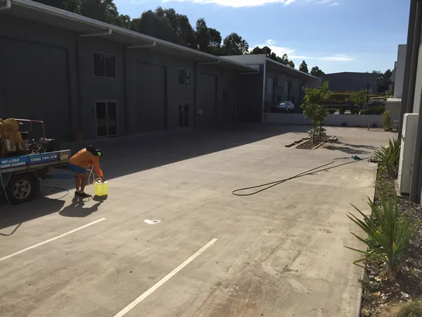 cleaning carpark concrete - before